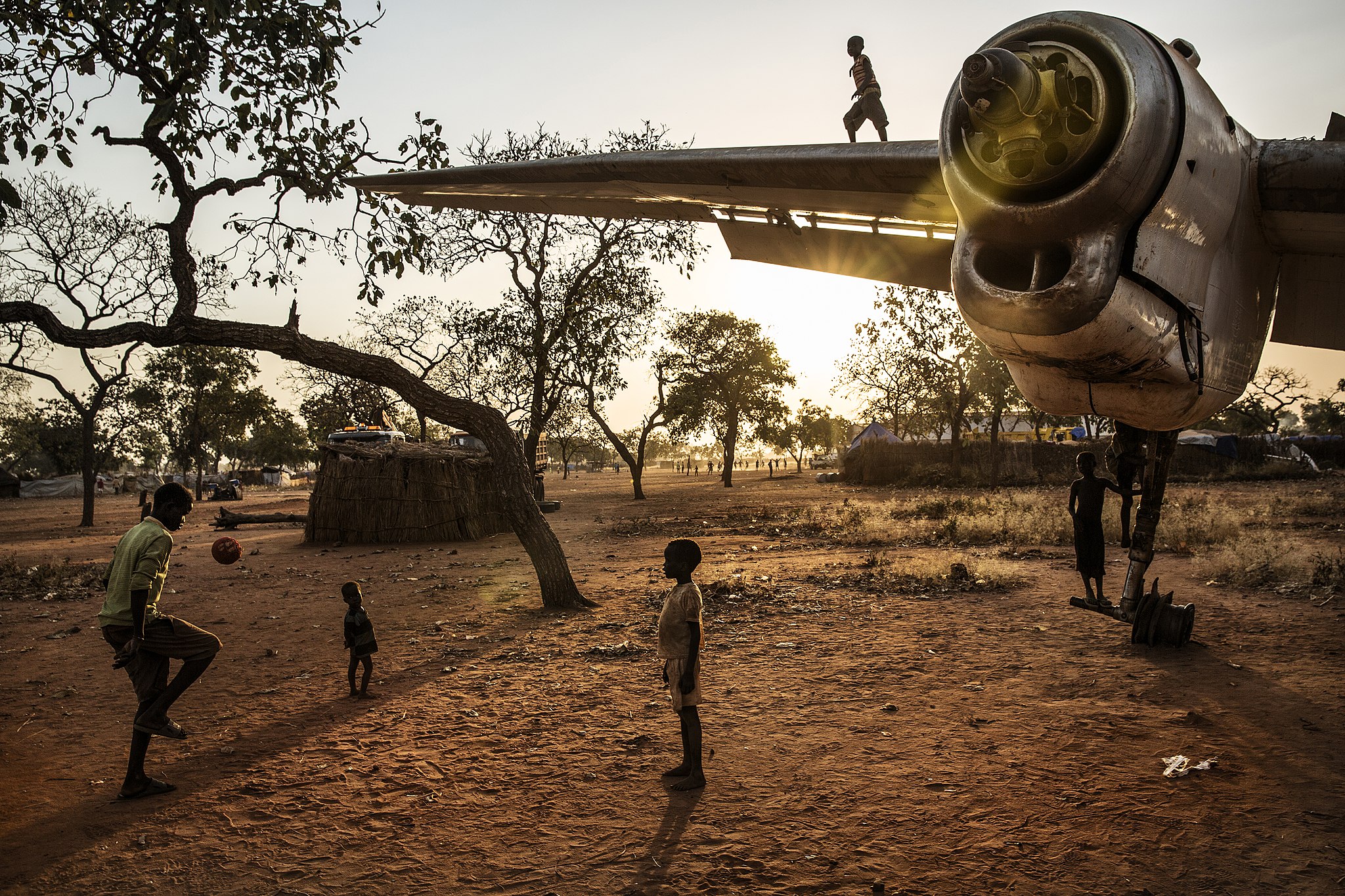 Children play on the wreck of an Antonov transport plane in the Yida refugee camp.