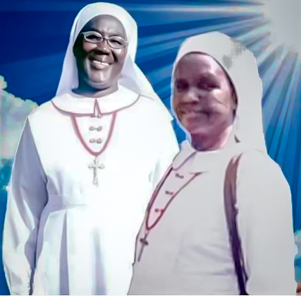 Sisters Mary Daniel and Regina are dressed in their congregational outfits of white with a gold cross. White scarves cover their hair. 