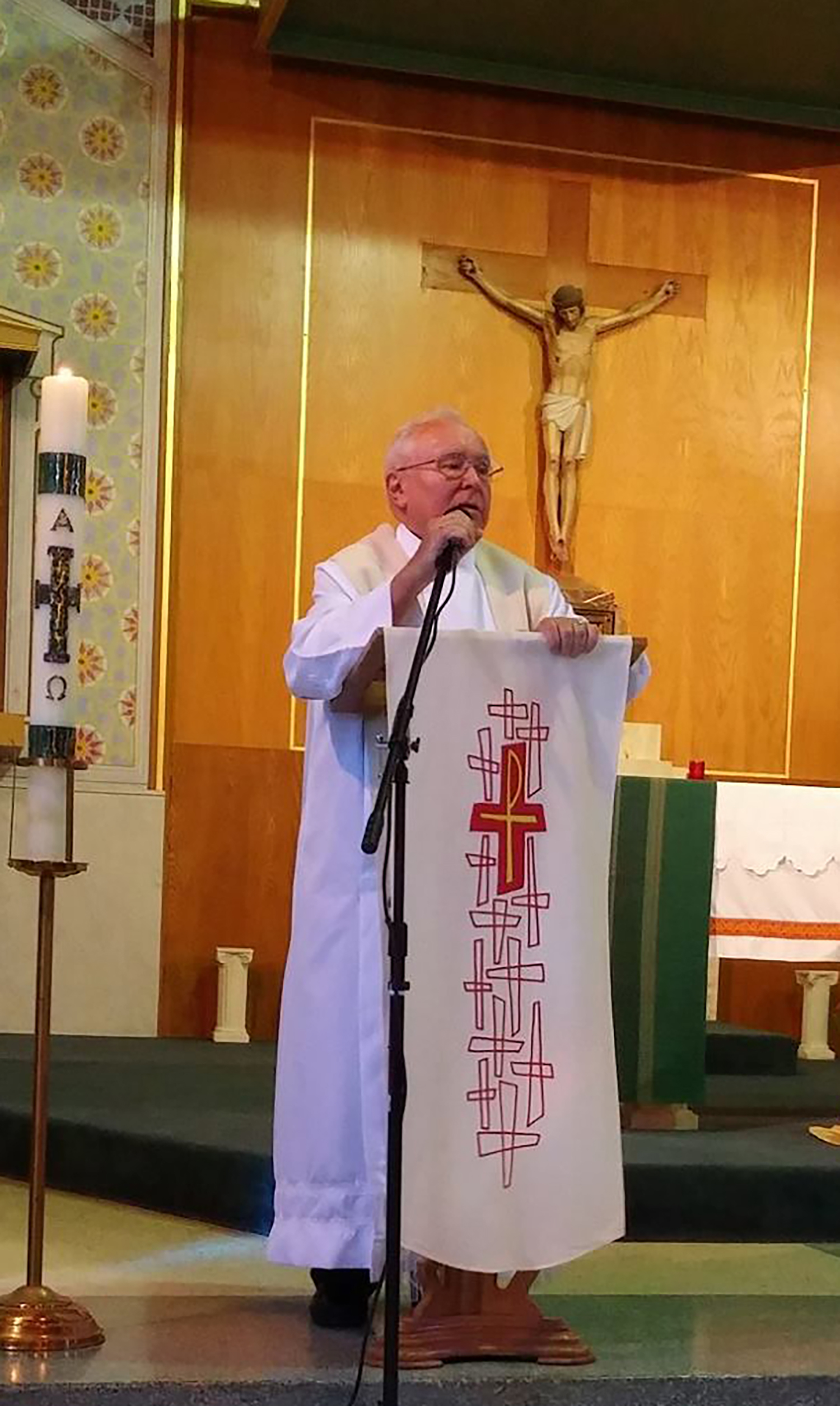 Fr Louie offers a homily during Mass at the Comboni Mission Center